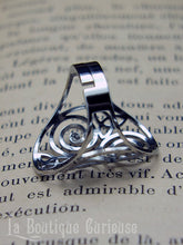 Load image into Gallery viewer, Bague ajustable acier Triskel et Triquetra - argentée ou dorée