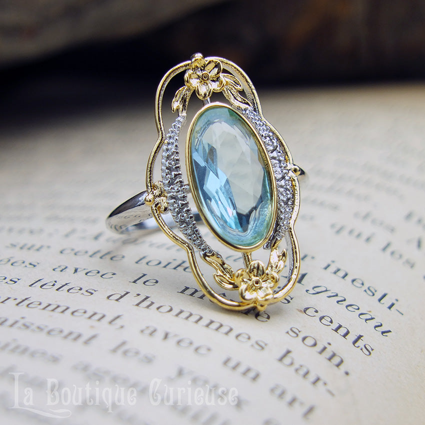 Bague femme style art nouveau imitation aigue-marine argent et or